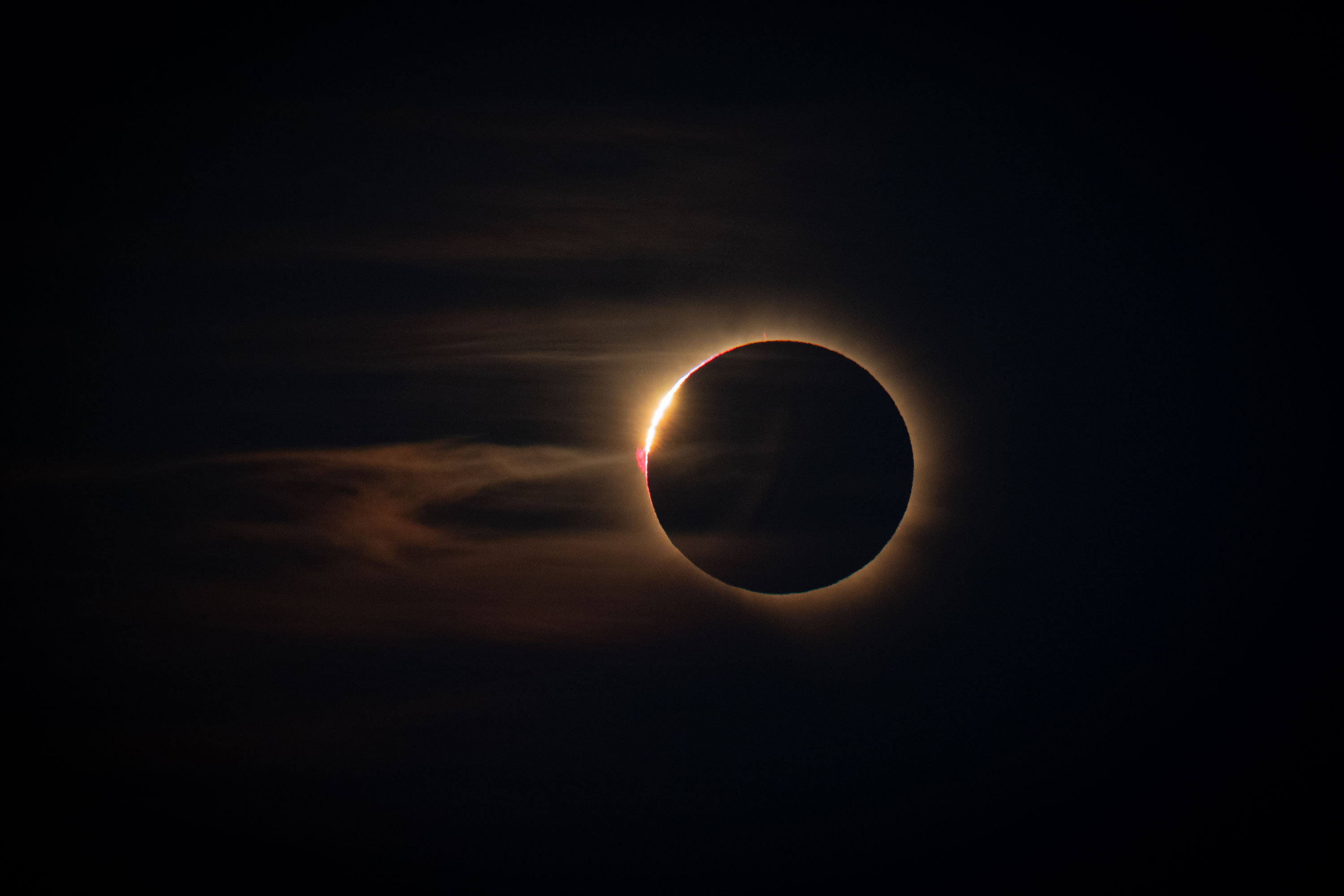 The diamond ring: a single bright bead of sunlight on the edge of the moon's disc.